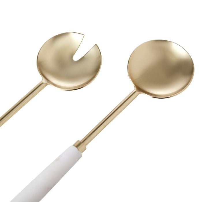 The IsAlbi Marble and Stainless Salad Servers S/2 includes two gold-toned servers with white marble handles—one a rounded spoon, the other forked—displayed on a plain white background.